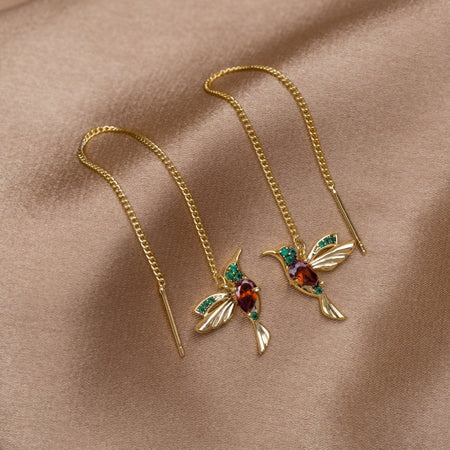 Anelli in oro con un delicato pendente