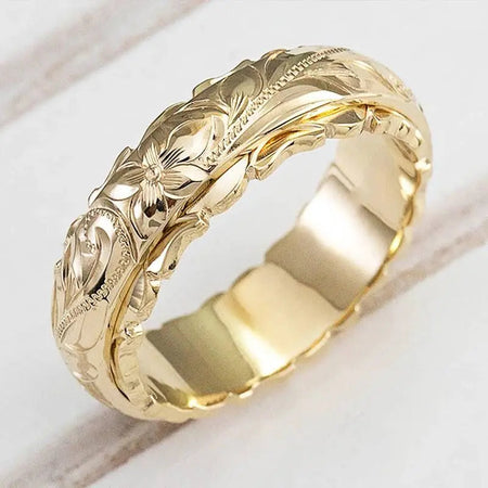 Mila - Anello in oro con fiore ispirato all&